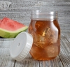 A Picture of product FIS-4517LH Quenchers Mason Jar Lids with Straw Holes. 3 X 0.75 in. White. 16/bag, 16 bags/carton.