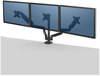 A Picture of product FEL-8042601 Fellowes® Platinum Series Triple Monitor Arm for 27" Monitors, 360 deg Rotation, +85/-20 Tilt, Pan, Black, Supports 20 lb