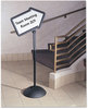 A Picture of product SAF-4173BL Safco® WriteWay™ Double-Sided Dry Erase Standing Message Sign Magnetic Arrow, 64.25" Tall Black Stand, 25.5 x 17.75 White Face