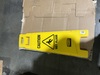 A Picture of product 966-523 Rubbermaid Floor Sign with "Caution Wet Floor" Imprint, 4-Sided. 38" L x 12" W x 37" H. 16" Deep. Yellow. Foldable.