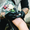 A Picture of product AXC-ABNPF48100 AMMEX® Professional Powder-Free Nitrile Exam Gloves. Size X-Large. 3 mil. Black. 100/box, 10 boxes/carton.