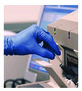 A Picture of product AXC-ACNPF44100 AMMEX® Professional Powder-Free Nitrile Exam Gloves. Size Medium. 3 mil. Blue. 100/box.
