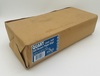 A Picture of product 711-202 Liquor Bag.  Kraft Paper. Quart Size.  35# Basis Weight.  500 Bags/Bale. Measurements: 4-1/2" x 2-1/2" x 16"